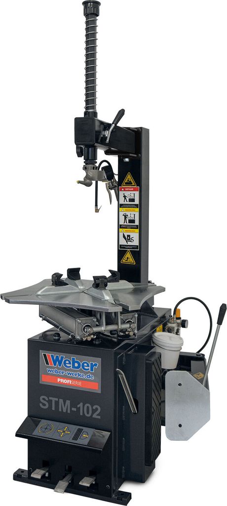 A professional studio shot of a tire changing machine against a white background.