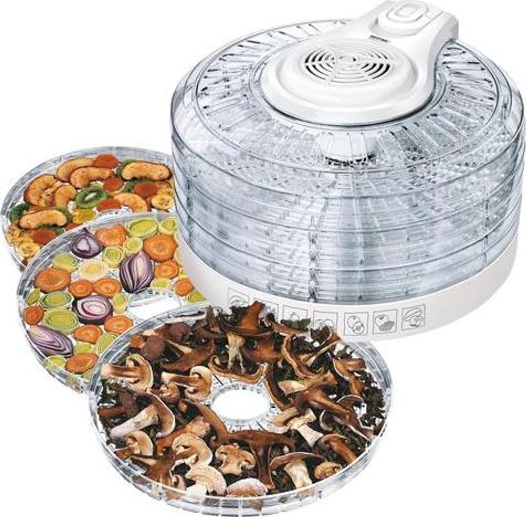 A food dehydrator with multiple trays filled with various foods, including mushrooms, vegetables, and fruit, is shown against a white background.