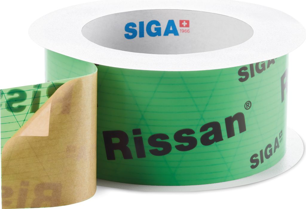 A roll of green tape with black text and a white spool.