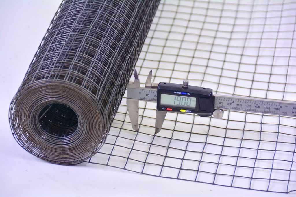 A roll of wire mesh is shown with a caliper measuring the mesh size.