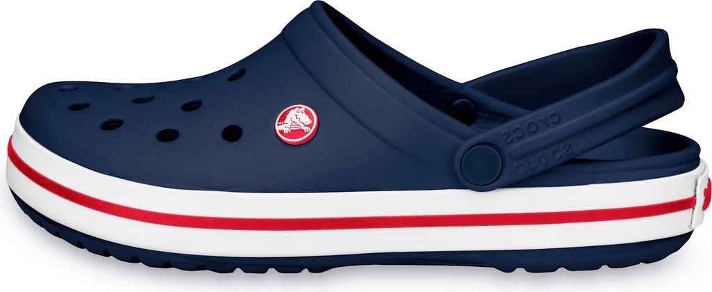 A side view of a navy blue Crocband clog with white and red stripes around the sole.