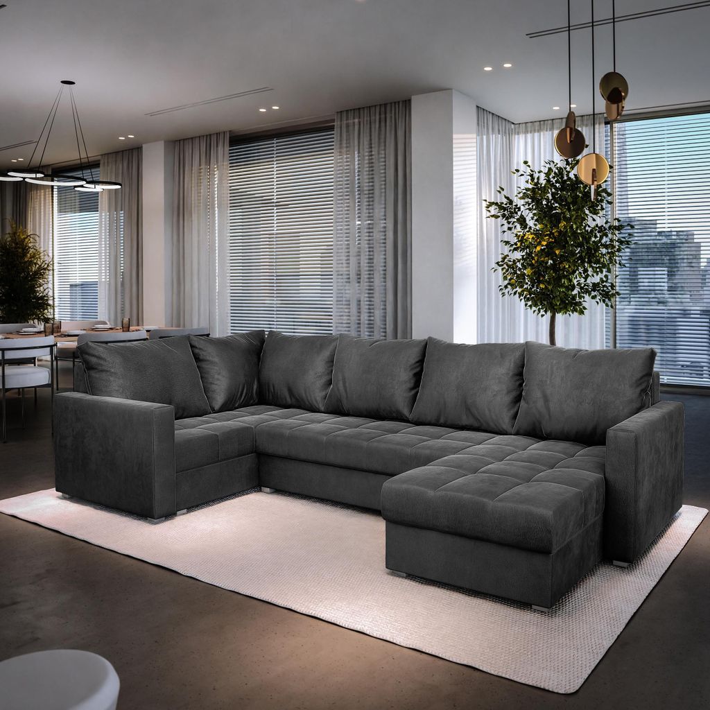 A modern living room with a large sectional sofa.
