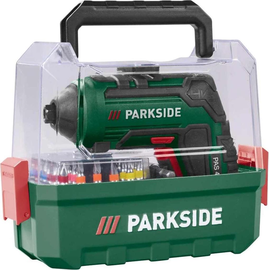 A green and black Parkside cordless screwdriver with accessories in a clear plastic case.