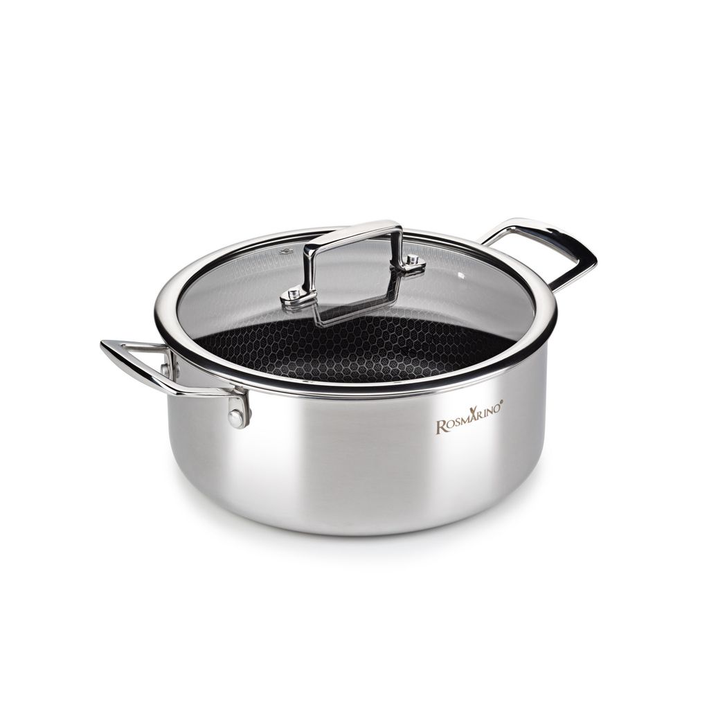 A stainless steel pot with a glass lid and honeycomb pattern inside.