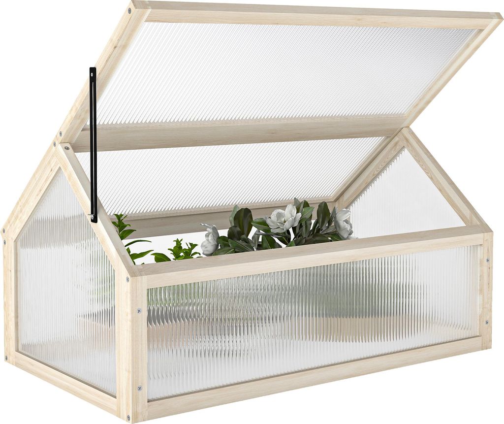 A wooden greenhouse with a clear, ribbed plastic cover, containing plants.
