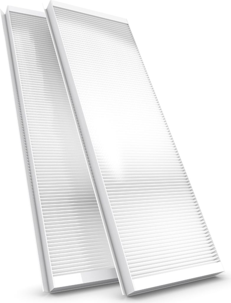 Two white air filters are shown from a diagonal angle against a white background.