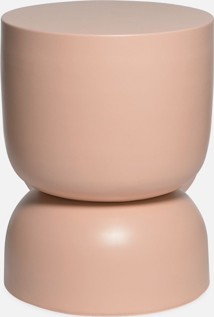 A pink cylindrical side table.