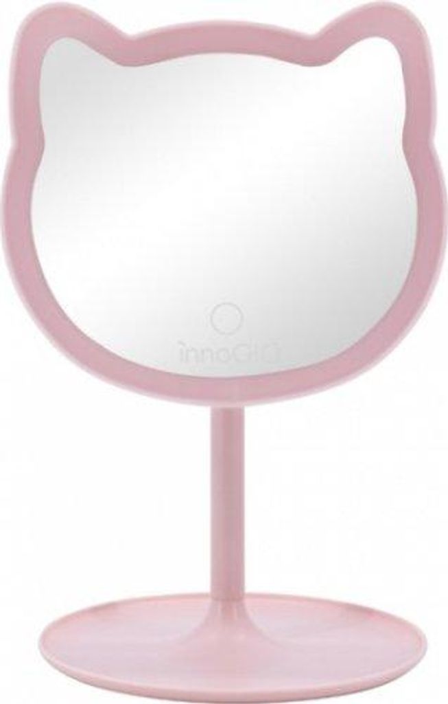A pink cat-shaped makeup mirror with a stand.