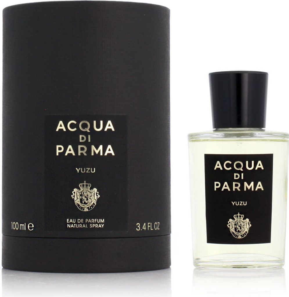 A bottle of Acqua di Parma Yuzu Eau de Parfum and its cylindrical packaging are displayed against a white background.