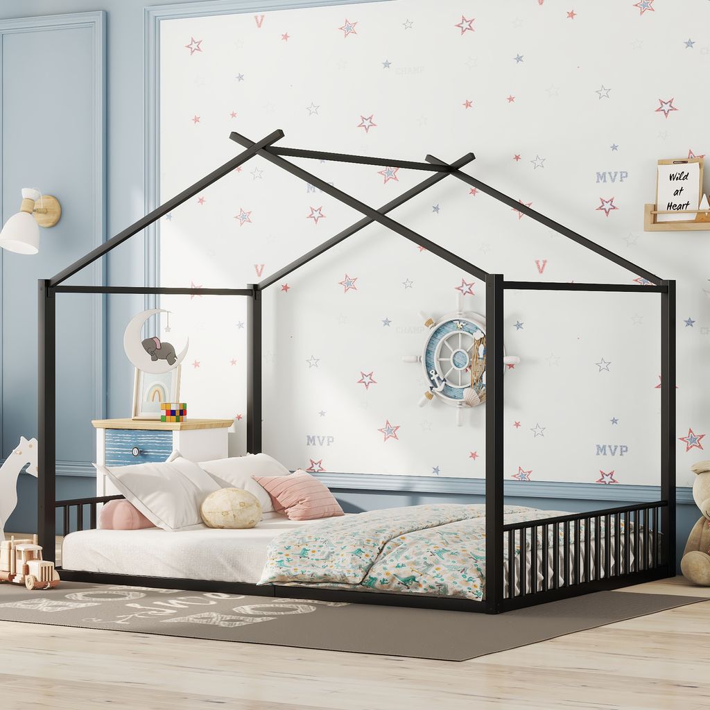 A child's bedroom with a house-shaped bed.