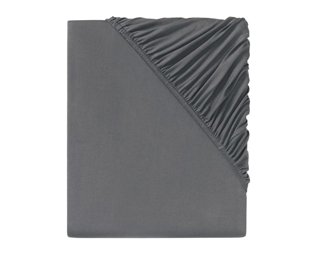A close-up view of a gray fitted sheet, showing the elasticized corner.