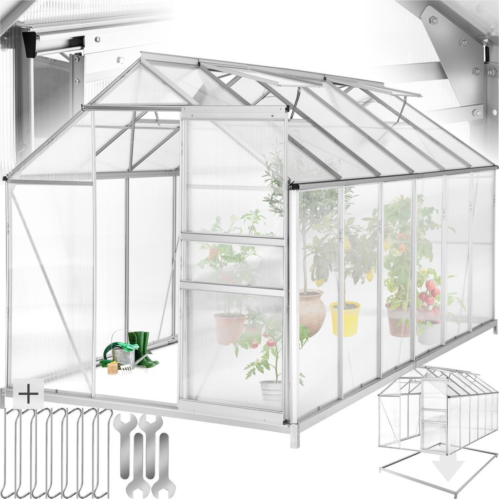 A greenhouse with plants inside, shown from the front with an open door. Tools and a small diagram of the greenhouse are also visible.