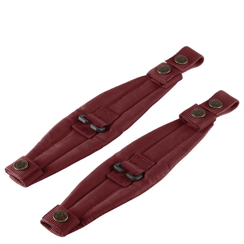 Two maroon straps with metal clasps and buckles against a white background.