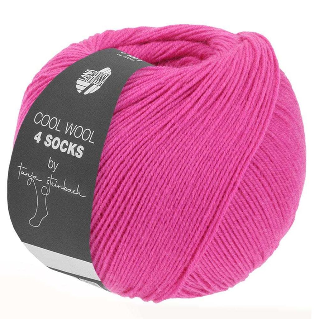 A ball of bright pink yarn with a label.