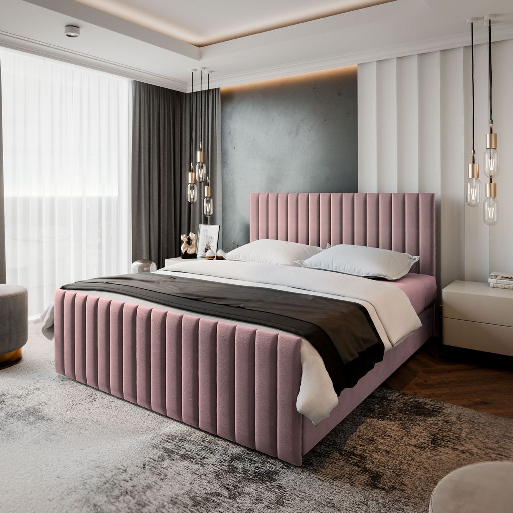 A modern bedroom with a pink upholstered bed as the main focus.