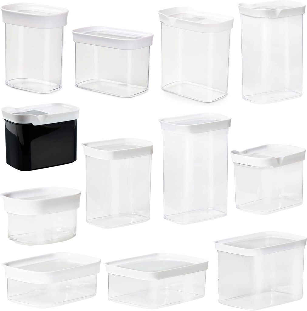 A collection of various sizes and shapes of clear and black plastic food storage containers with white lids, arranged in a grid.