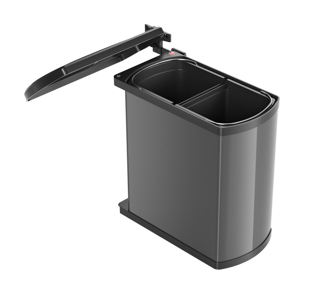 A dark gray and black dual-compartment trash can with its lid open, shown against a white background.