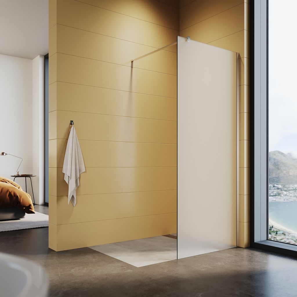 A modern bathroom with a walk-in shower and a view of the ocean.