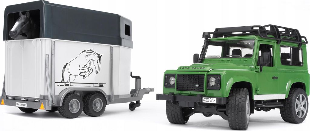 A toy Land Rover Defender and a toy horse trailer are shown side-by-side against a white background.