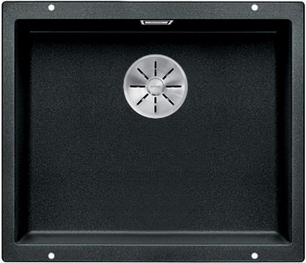 A top-down view of a black kitchen sink with a silver drain.