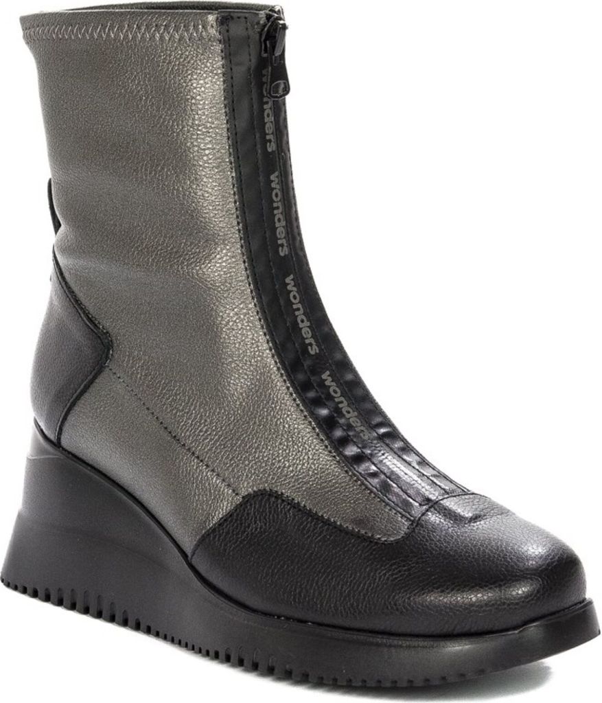A studio shot of a single boot against a white background.