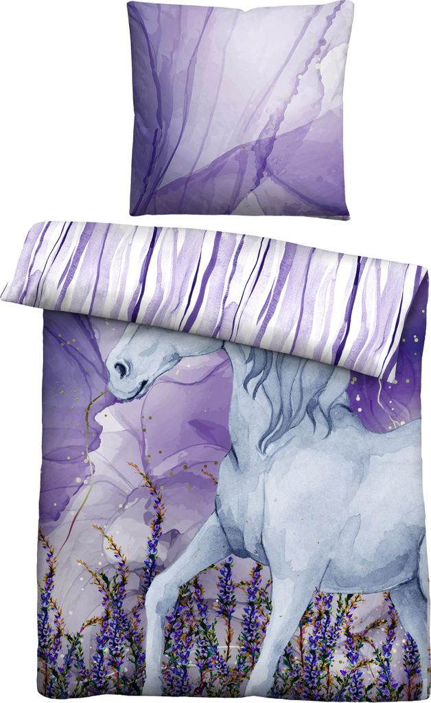 A duvet cover and pillowcase set with a unicorn and floral design.