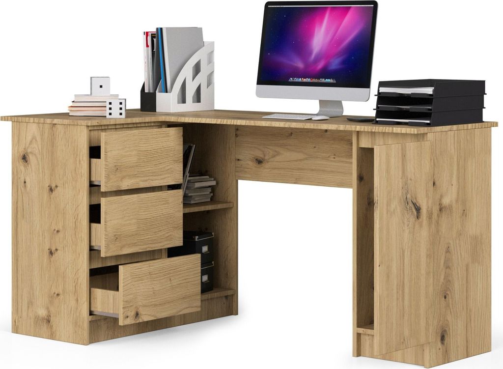 A corner desk with drawers and shelves, a computer monitor, and office supplies.