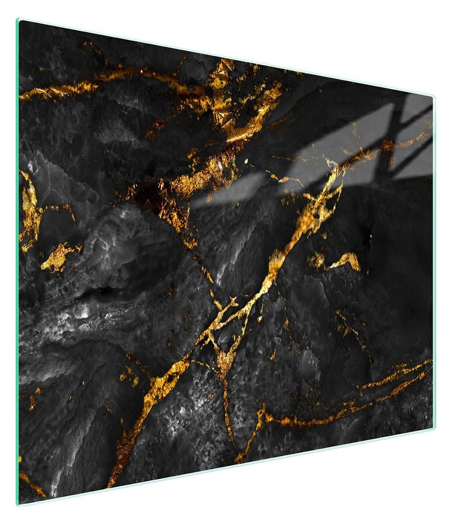 A close-up view of a black marble cutting board with gold veining.