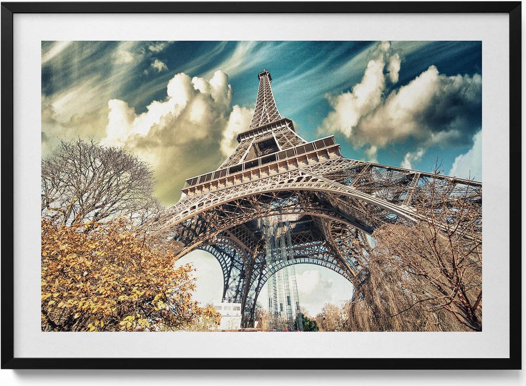 Ein herrlicher Blick auf den Eiffelturm– Wandbild mit Rahmen – Gerahmtes Bild – Wanddekoration – 100x70 cm – Schwarz Rahmen