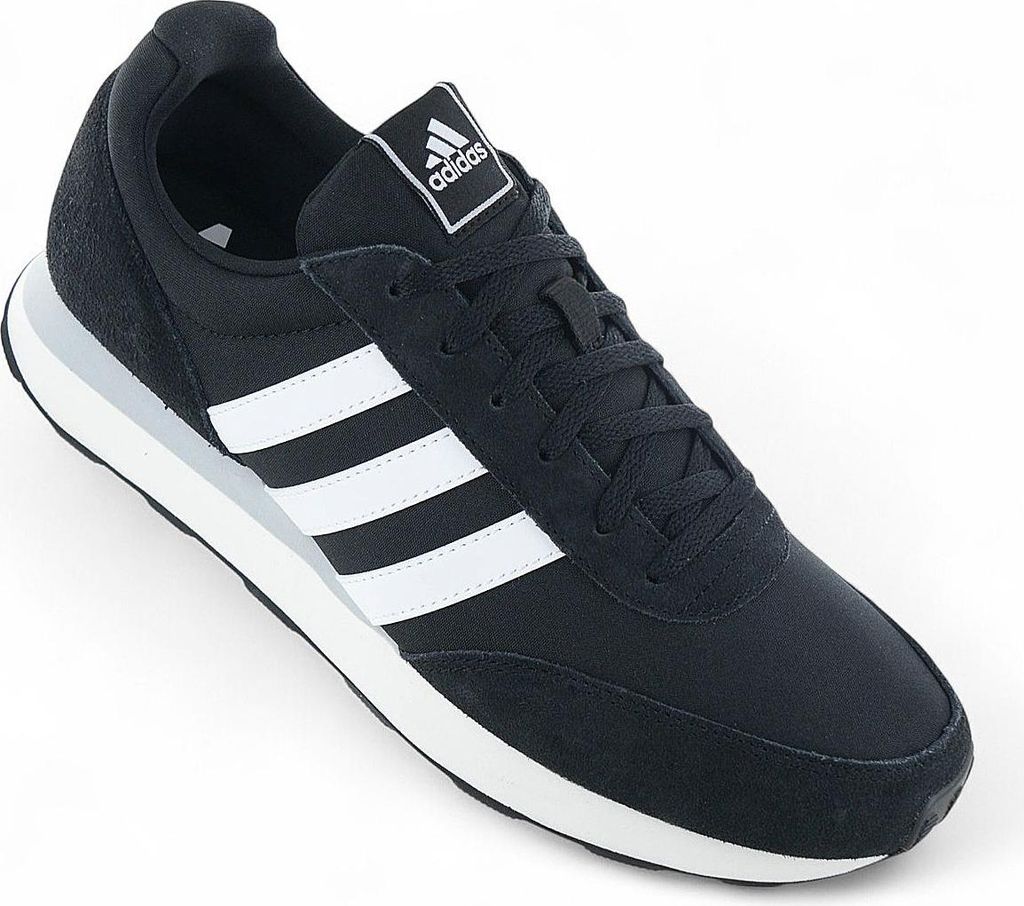 A single black Adidas sneaker with white stripes is shown against a white background.