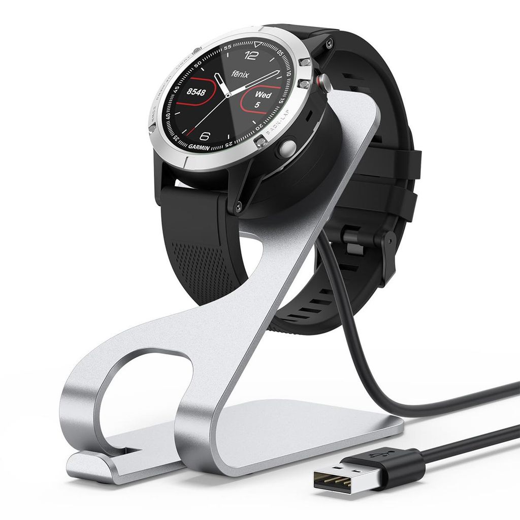 A smartwatch charging stand with a smartwatch on it, and a USB-C cable.