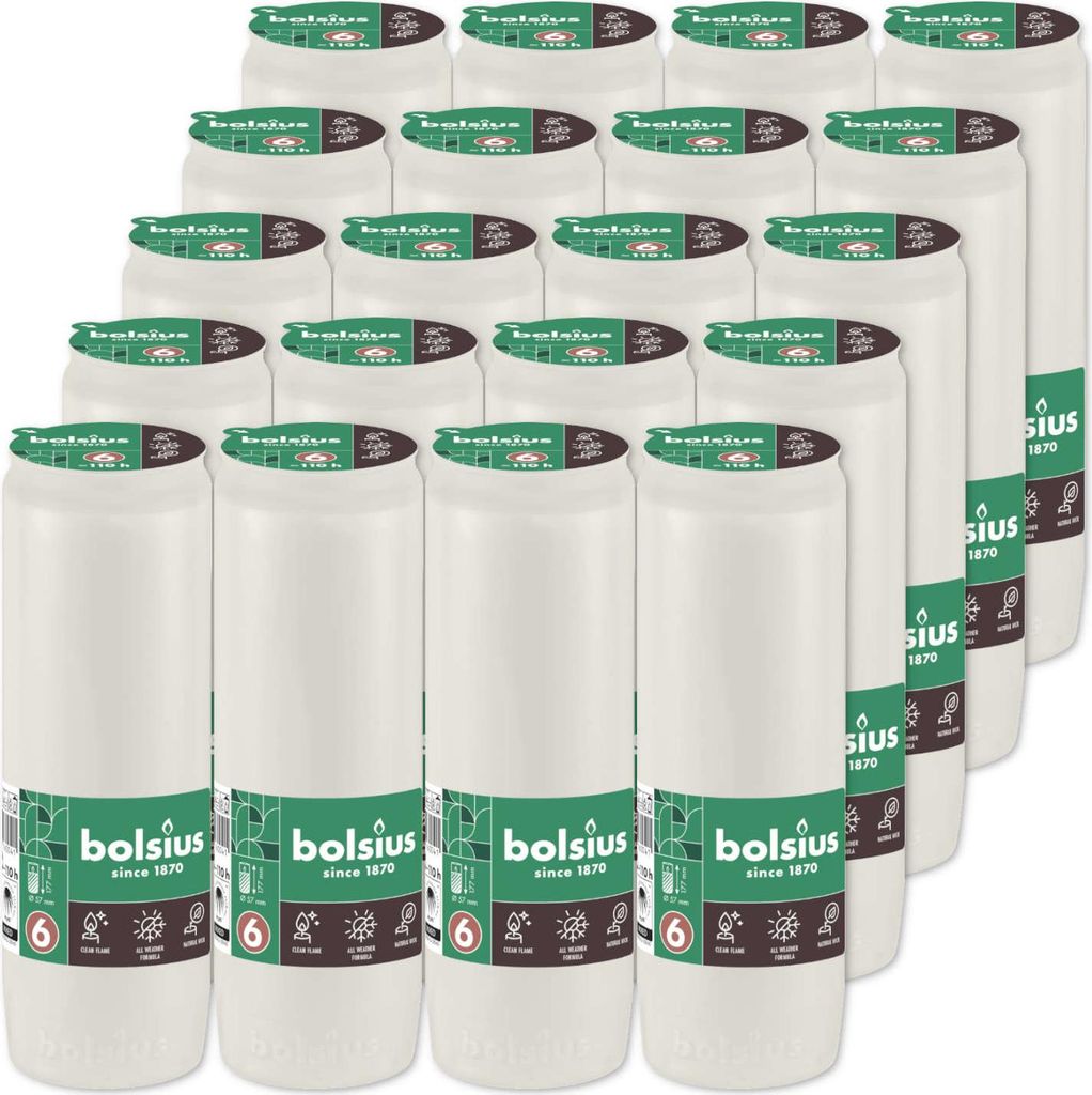 A stack of white candles with green labels.