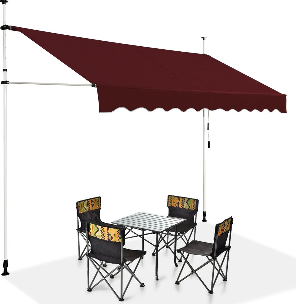 A portable awning set up over a small table and four chairs, suggesting an outdoor seating area.