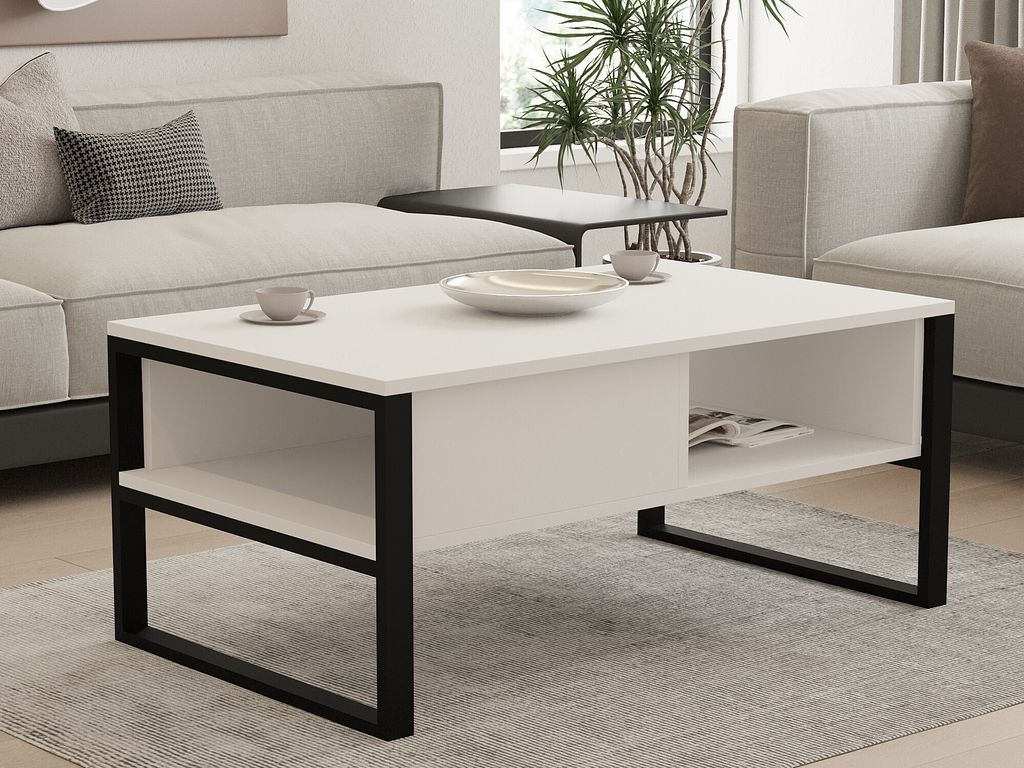 A modern living room setting with a white coffee table as the focal point.