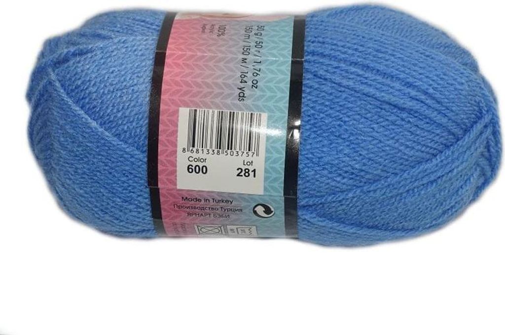A ball of blue yarn with a label showing product information.