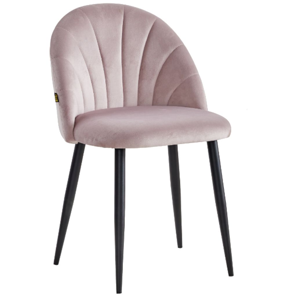 A single pink velvet dining chair with black metal legs, shown from the front.