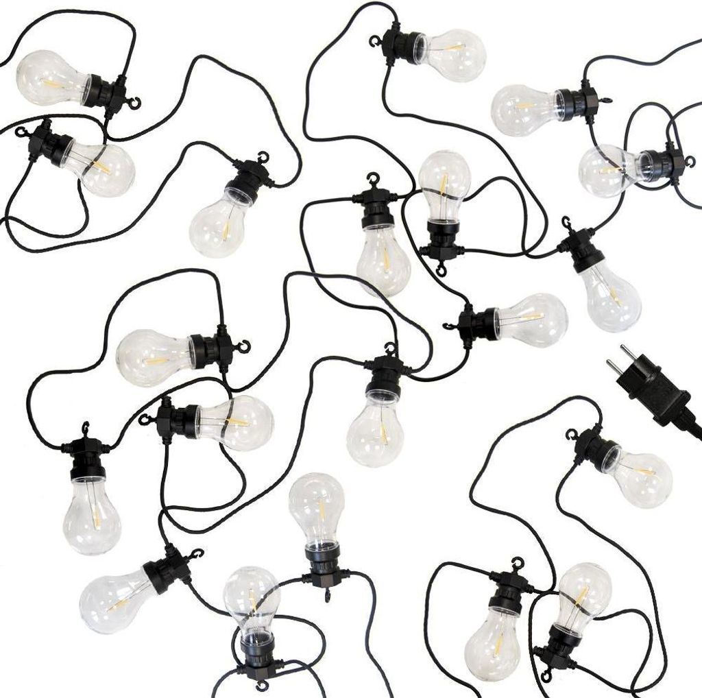 A string of LED lights with clear bulbs and black cords, arranged in a scattered pattern on a white background.