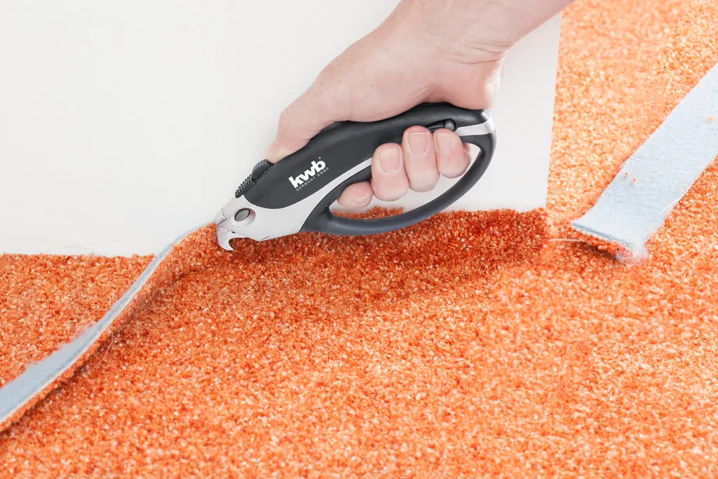 Couteau de bricolage pour pose de sol et moquette avec lame trapèze