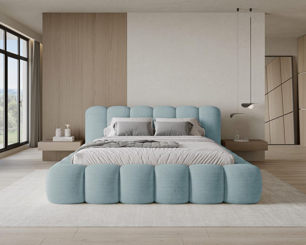 A modern bedroom with a light blue upholstered bed as the focal point.