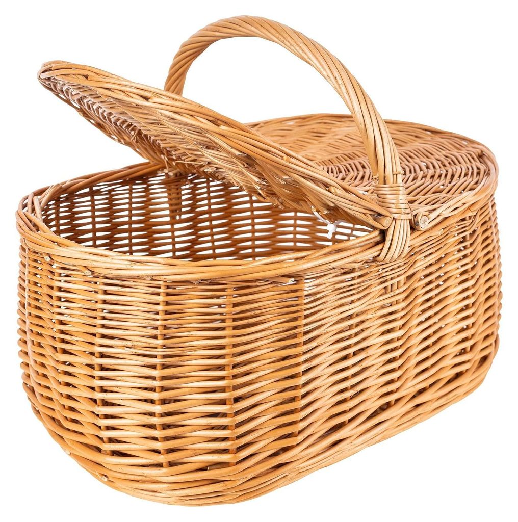 A woven wicker picnic basket with an open lid and a handle.