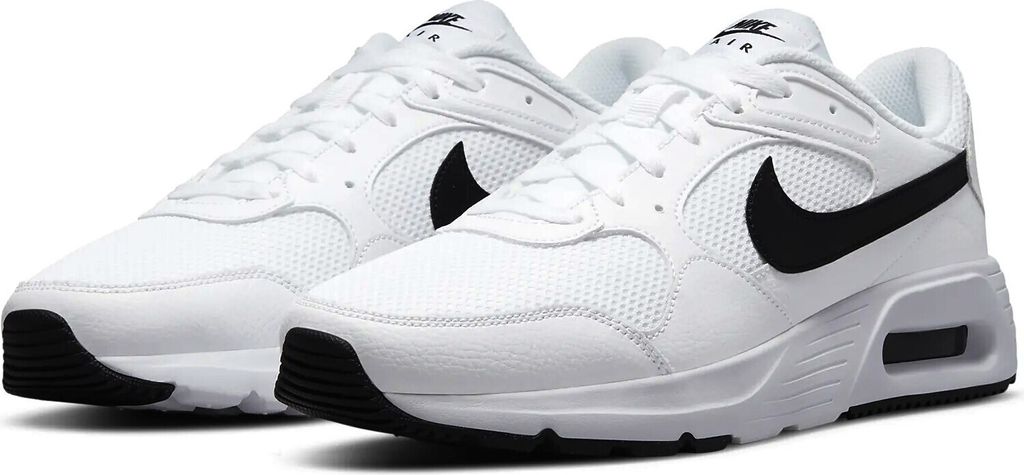 A pair of white Nike Air Max SC sneakers with black accents.