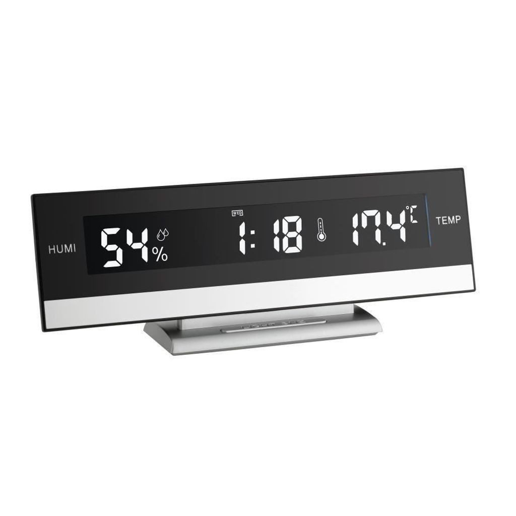 A digital clock displaying time, humidity, and temperature.