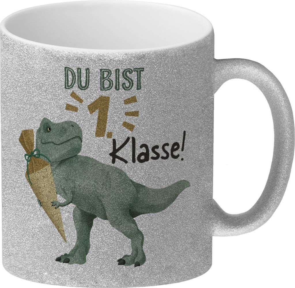 Dino mit Schultüte Glitzer-Kaffeebecher mit Spruch Du bist 1. Klasse!
