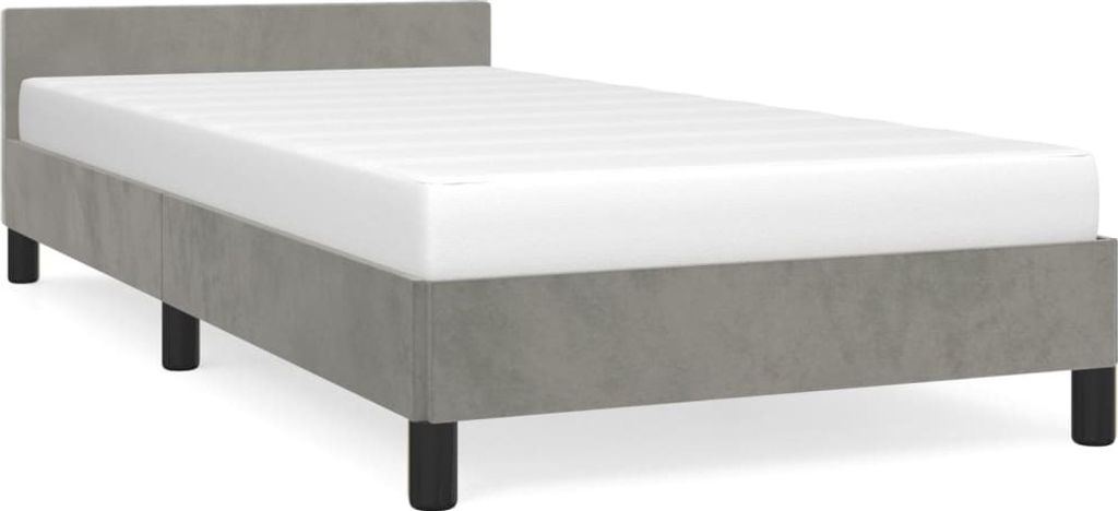A gray upholstered bed frame with a white mattress.