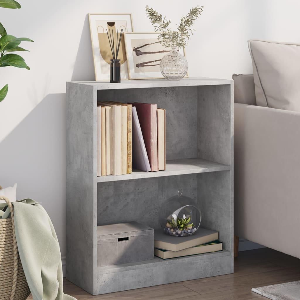 A bookshelf with books and decorative items in a room setting.