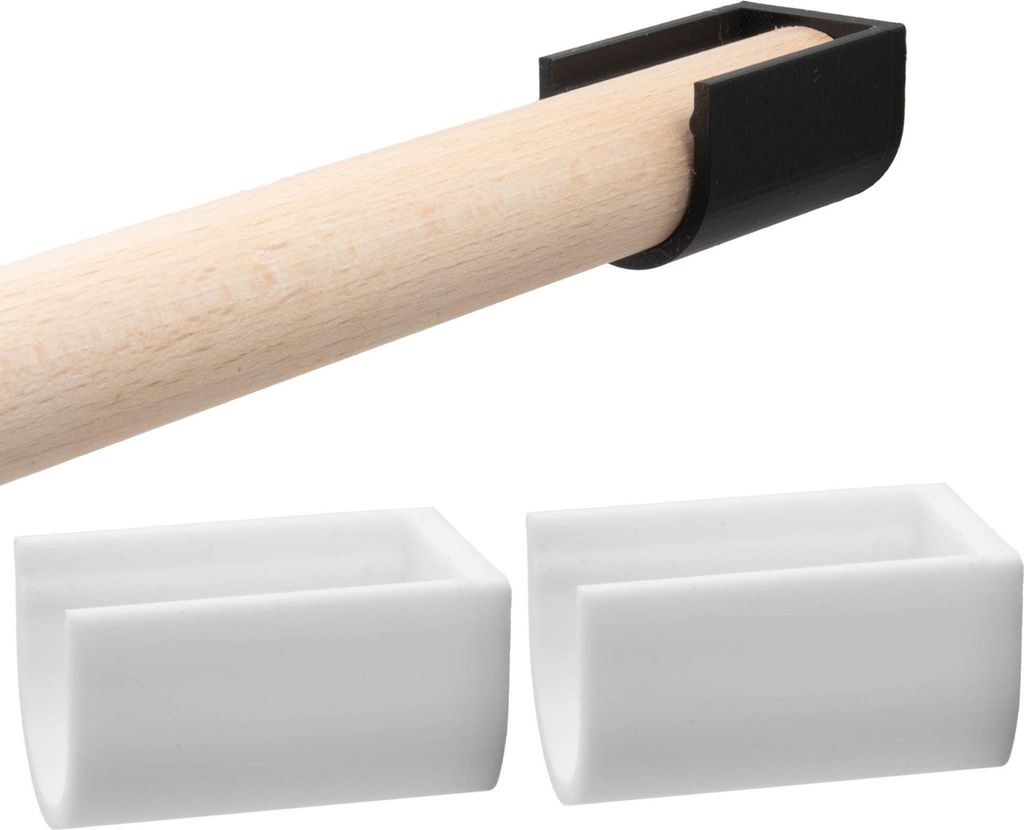 A wooden rod with a black end cap, and two white U-shaped holders.