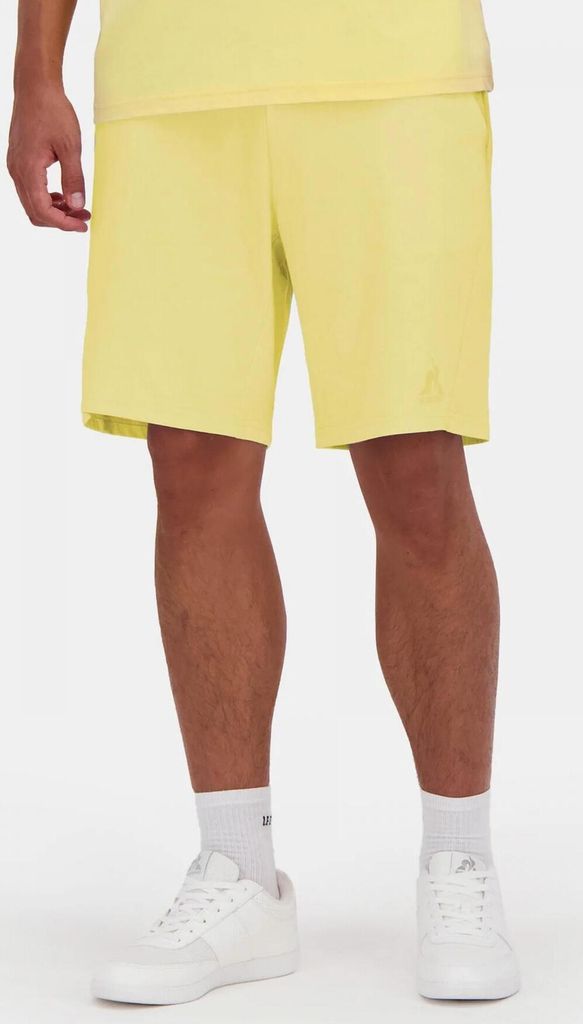 Le Coq Sportif Shorts 2510633 in Yellow color size x-large