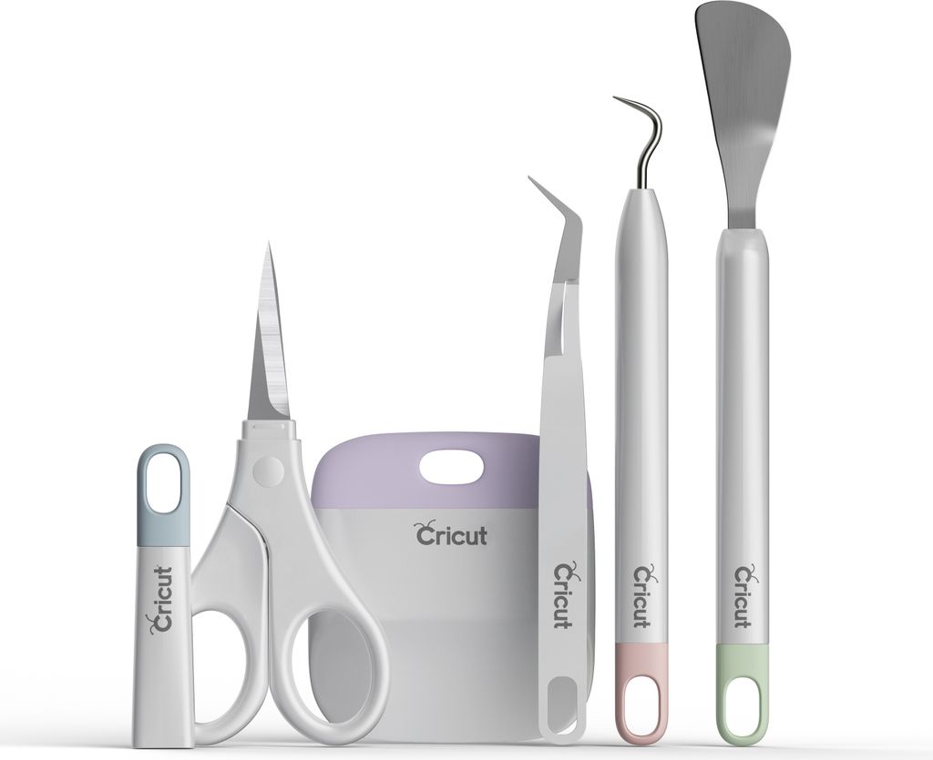A set of Cricut crafting tools arranged on a white background.