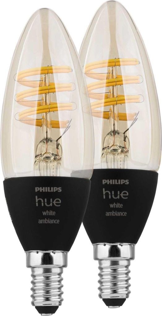 Two Philips Hue LED candle light bulbs are shown against a white background.