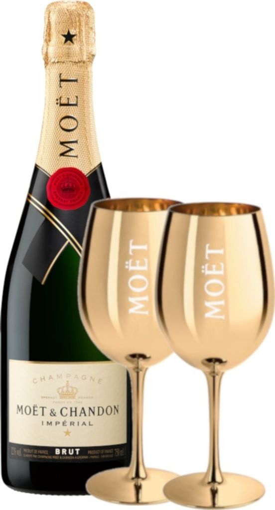 A bottle of Moët & Chandon champagne and two gold champagne glasses.